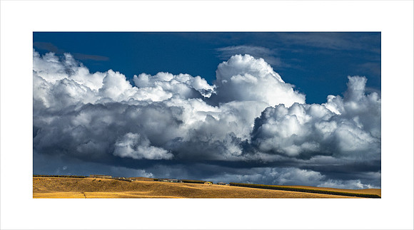 ]]CLOUDS OVER FARMLAND, TASMANIA