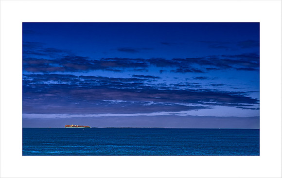 CONTAINER SHIP IN BLUE